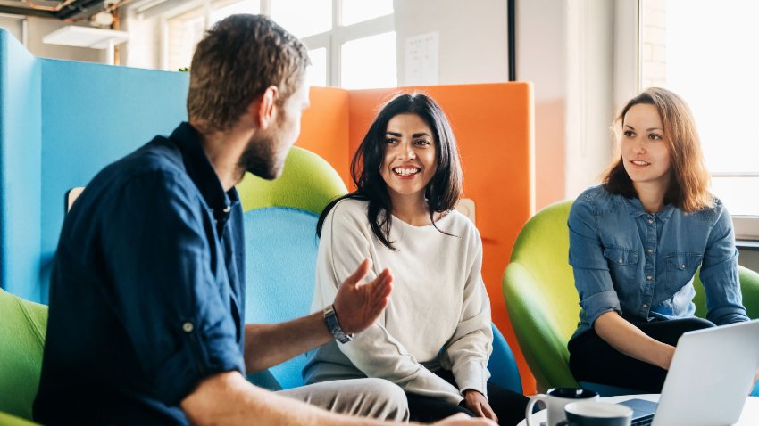 A group of employees in a meeting