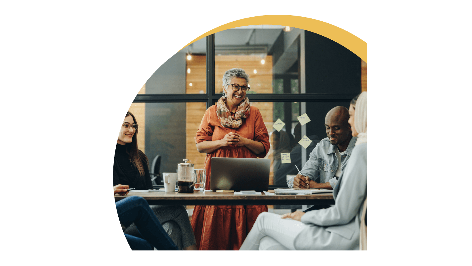 A group of people having a meeting in the office