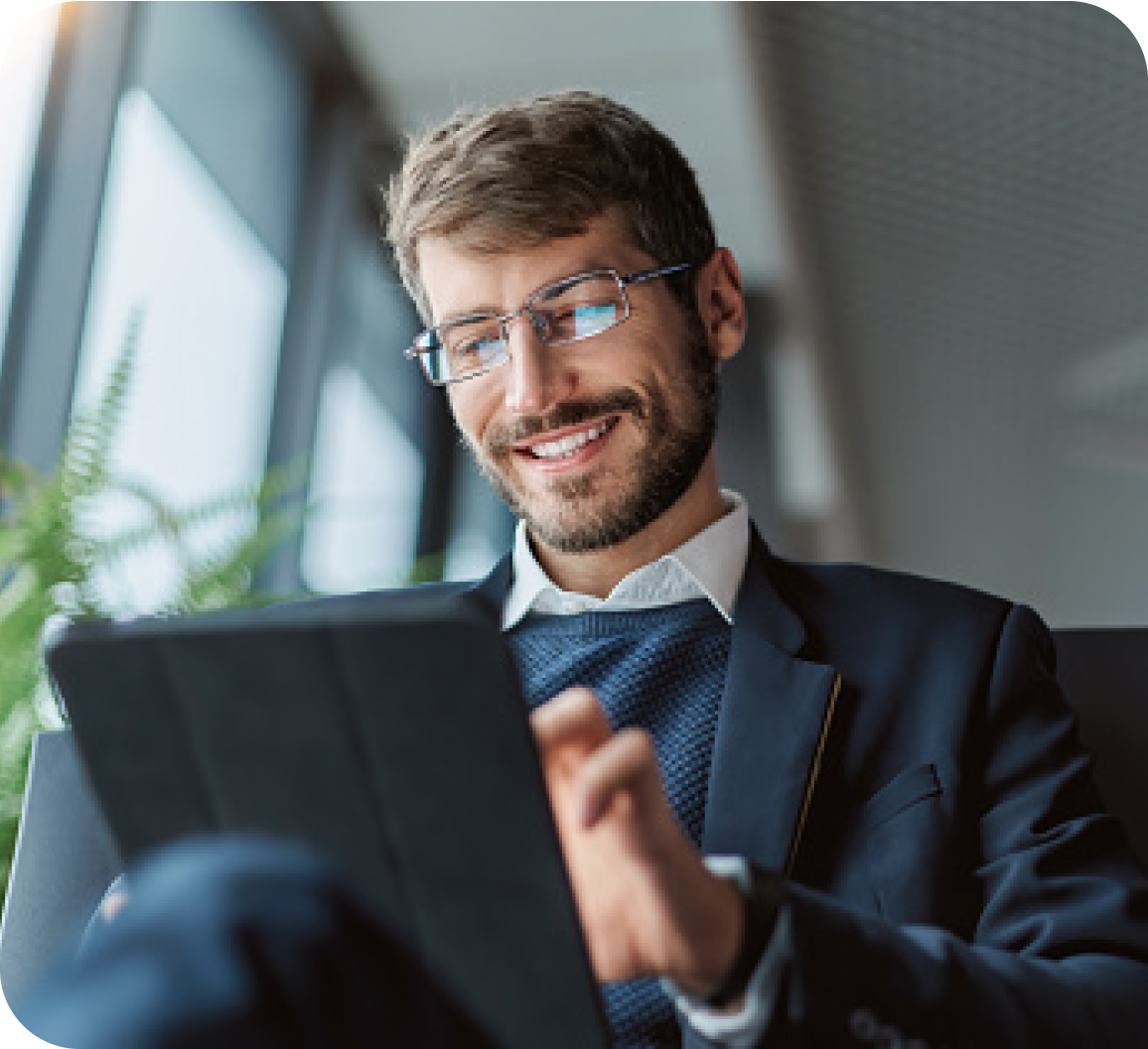 A business man operating an ipad