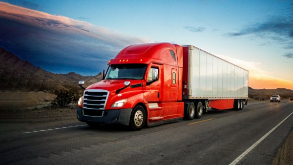 A red truck with cargo