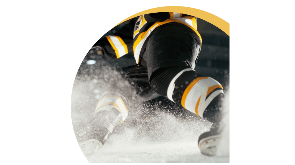 A man skating on ice rink