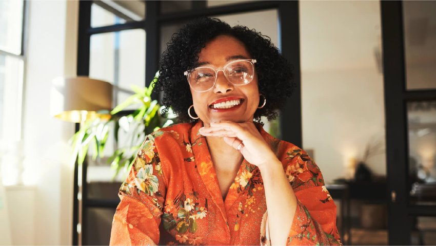 A young woman gazing at the camera with a smile